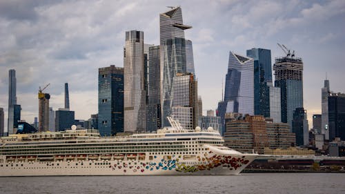 View of the Norwegian Gem Cruise Ship and Skyscraper at Hudson Yards in New York City, New York, USA