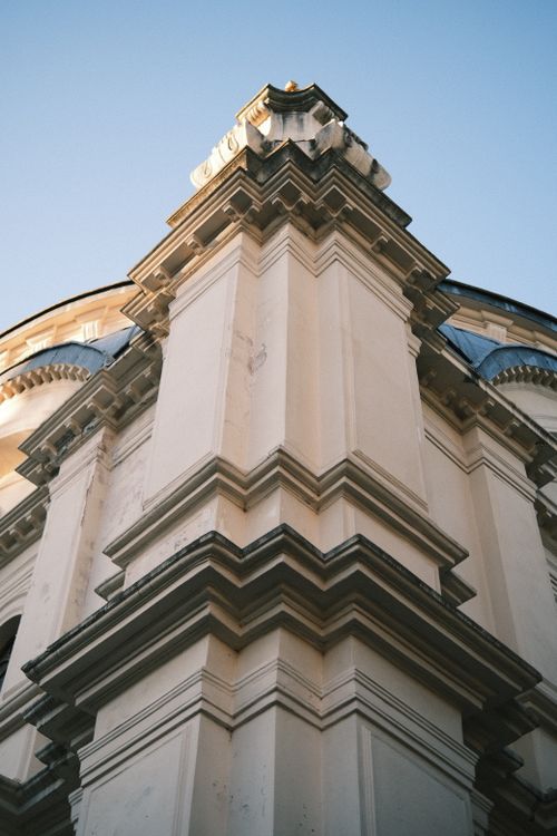 Free Close-up of a baroque architectural facade showcasing intricate details and symmetry. Stock Photo