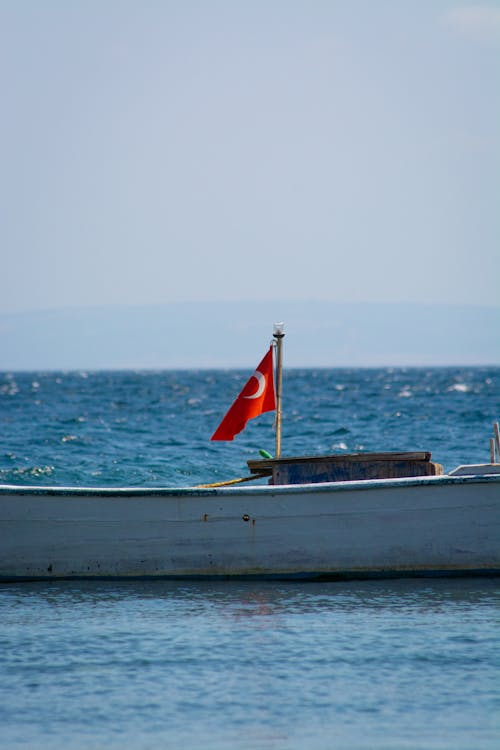 Turkish Flag on Boat on Shore