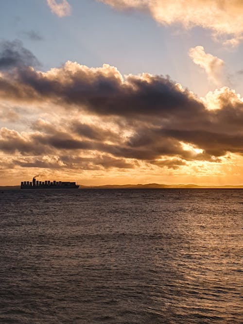 Cloud over Sea Coast at Sunset