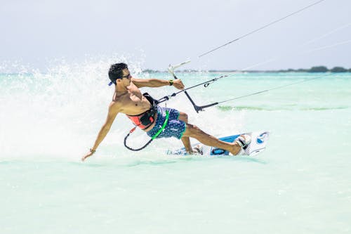 Man Kite Surfing on Ocean
