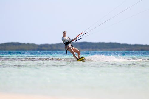 Woman Surfing on a Sea