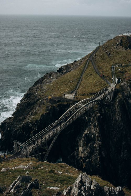 Free Stunning view of Mizen Head's iconic clifftop bridge with the vast ocean backdrop. Stock Photo