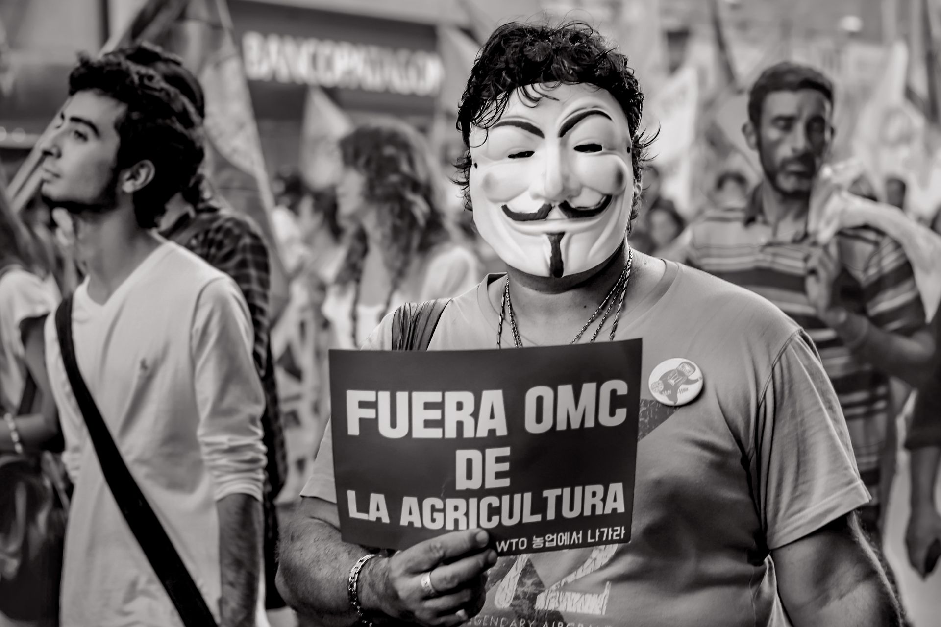 Man in Anonymous Mask on Protest in City