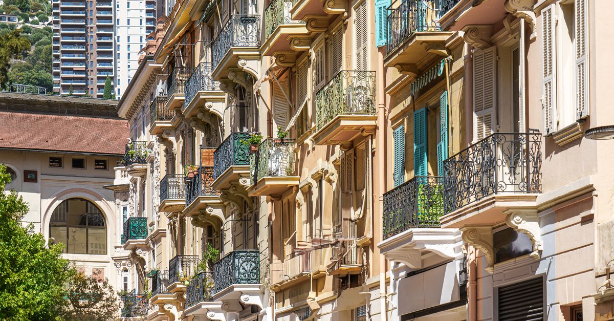 Elegant cityscape of Monaco with sunlit balconies, embodying urban charm.