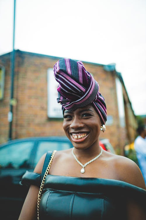 Cheerful Woman in Headscarf