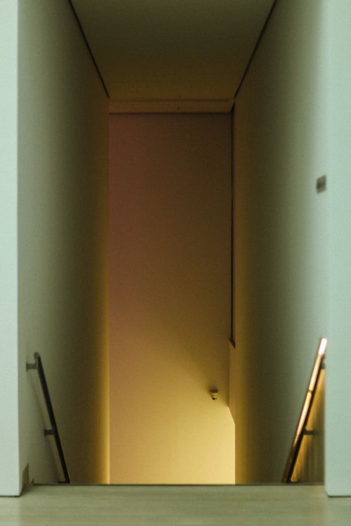 Free A minimalist staircase with soft lighting in a modern interior setting. Stock Photo