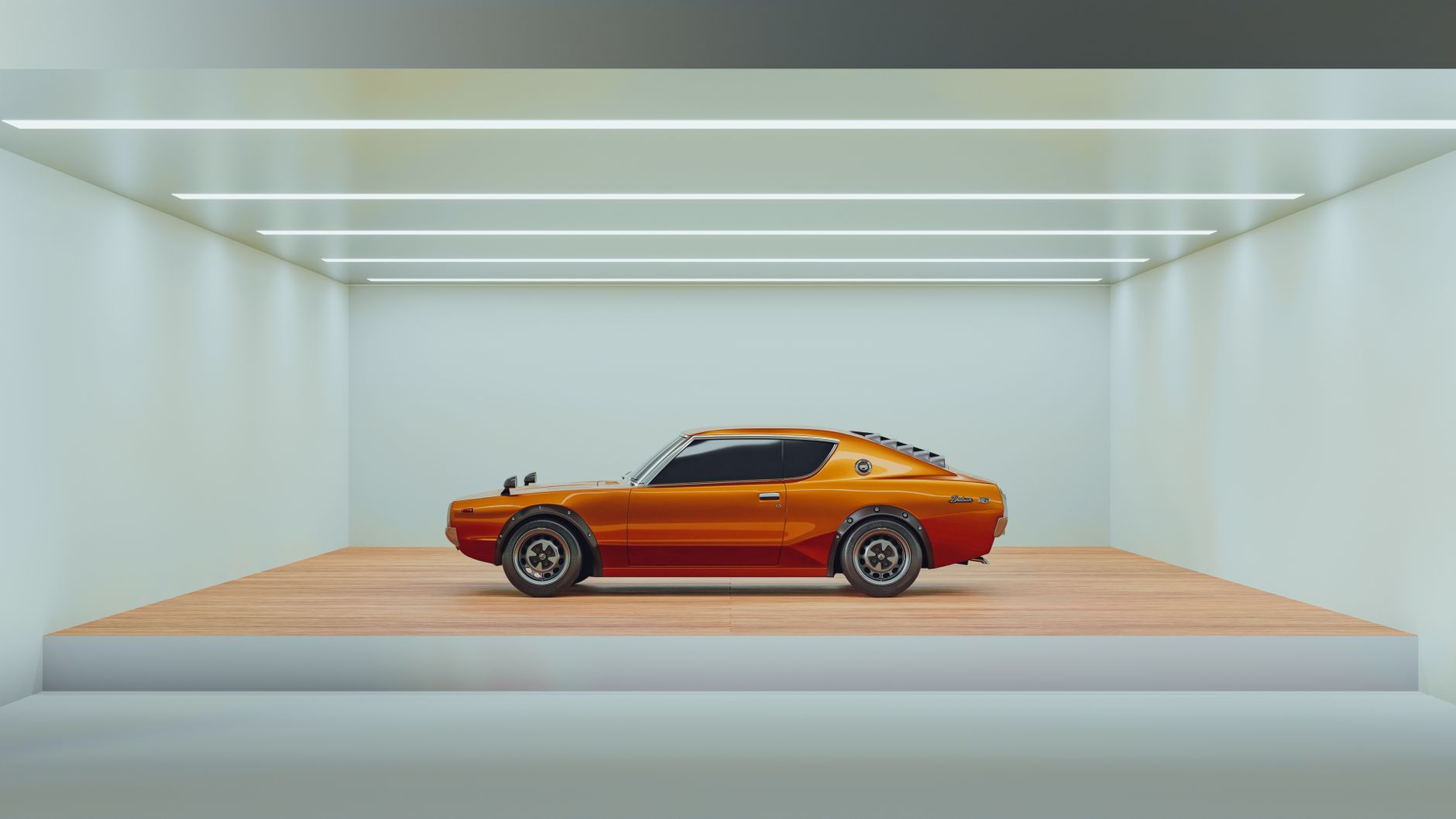 A classic orange car displayed in a minimalist indoor showroom with modern lighting.