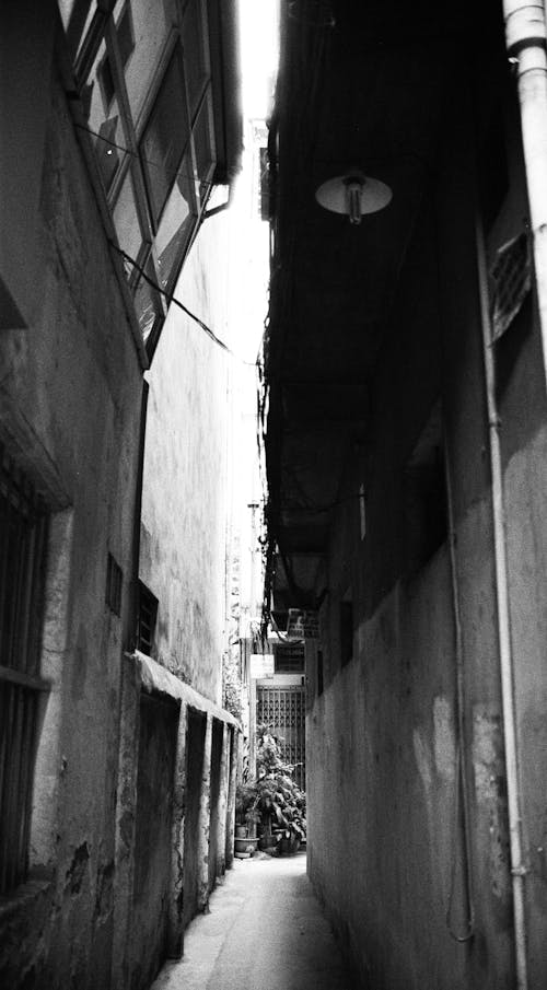 A Narrow Alley between Buildings in City 