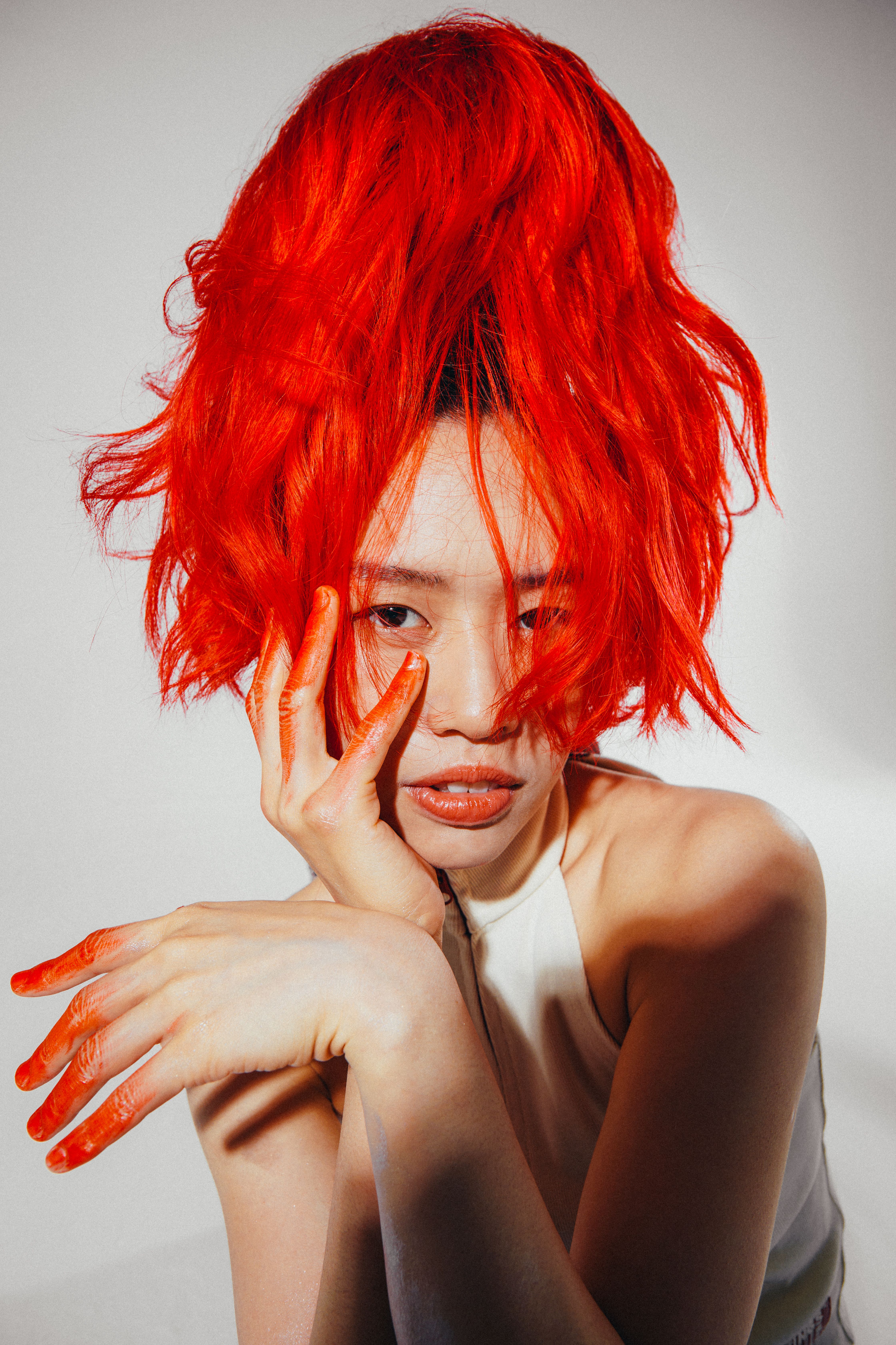 A woman with red hair posing for a photo · Free Stock Photo
