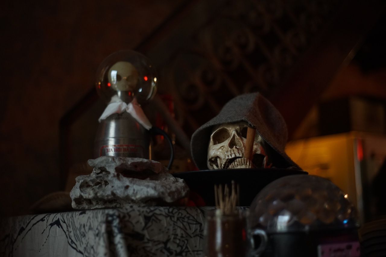 eerie still life with a skull and decor for a spooky halloween atmosph