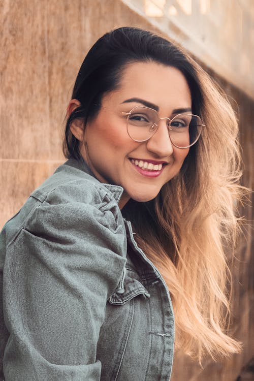Young Happy Woman Wearing Eyeglasses 