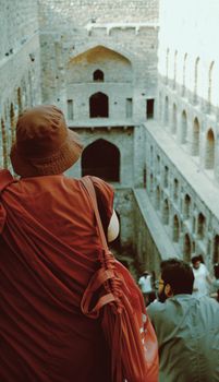 A traditional scene at Agrasen ki Baoli in Delhi, India showcasing historical architecture.