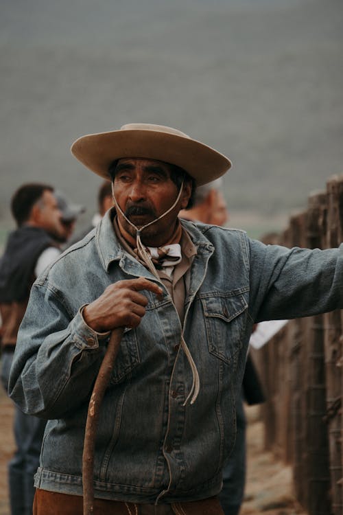 Elderly Cowboy on Field