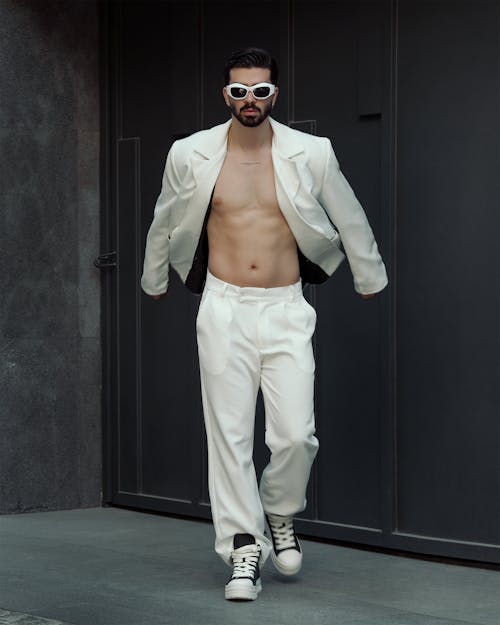 Handsome Model in White Jacket and Pants