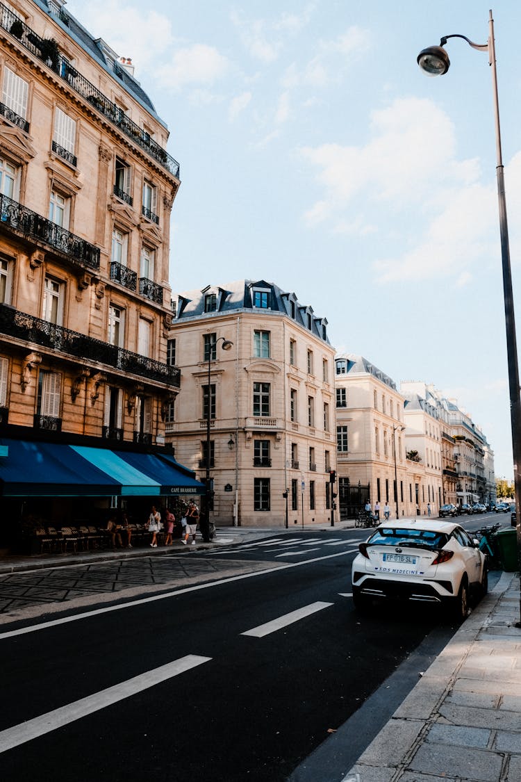 Awing Over Sidewalk Cafe In Paris