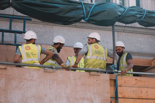 Foto profissional grátis de atividade, capacete, empregados