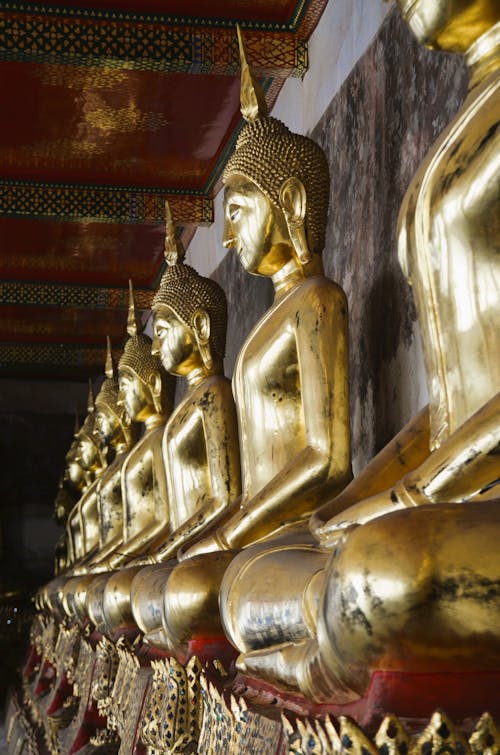 Row of Buddha Statues in Temple