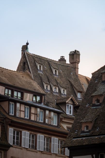 Explore the charming medieval architecture of Strasbourg with unique rooftops and historic buildings.