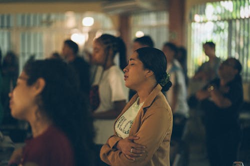 People Praying with their Eyes Closed