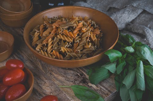 Pasta in Browl Bowl by Basil and Cherry Tomatoes