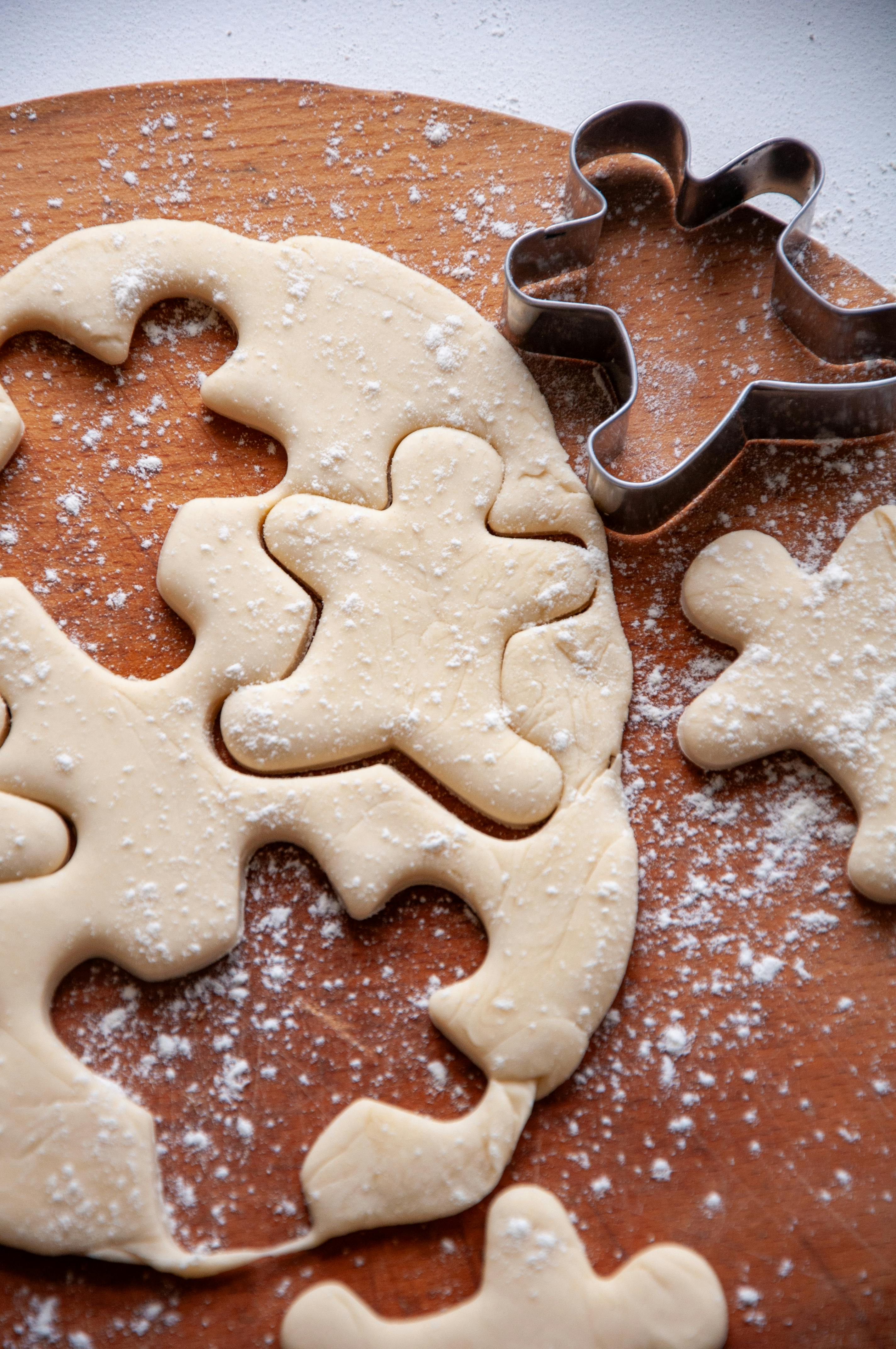 Gingerbread Men On Baking Sheet High-Res Stock Photo - Getty Images