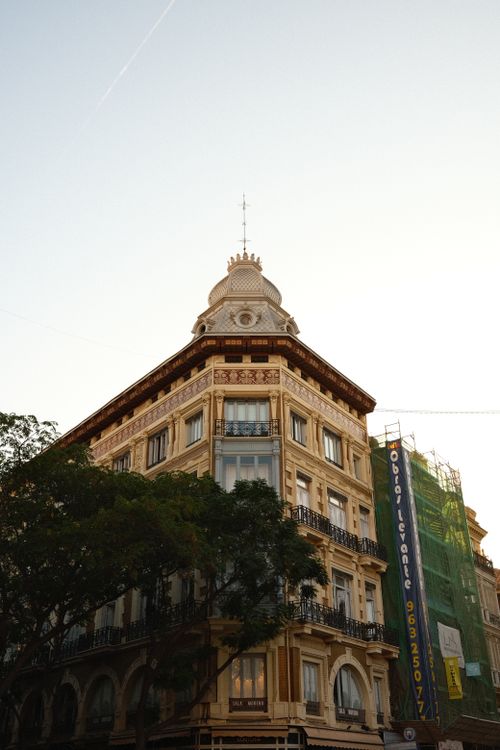 Free A classic architectural landmark in Valencia, captured from a low angle at sunrise. Stock Photo