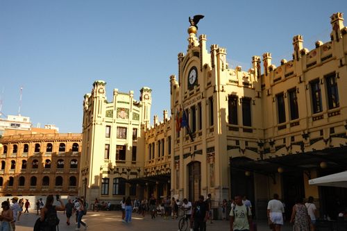 Free Captivating view of Valencia North Train Station at sunset with a vibrant crowd. Stock Photo