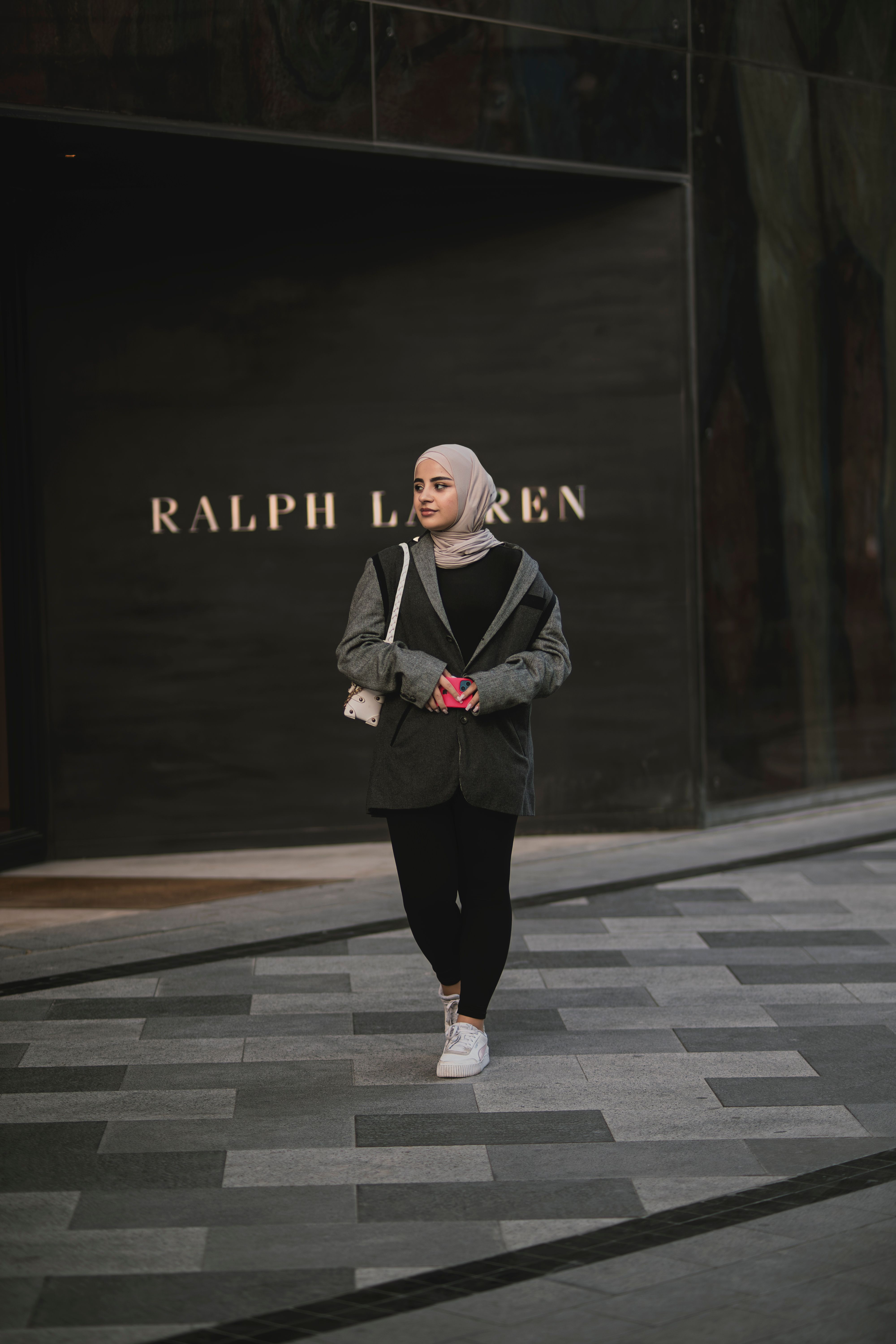 Woman in Hijab Walking on Sidewalk · Free Stock Photo