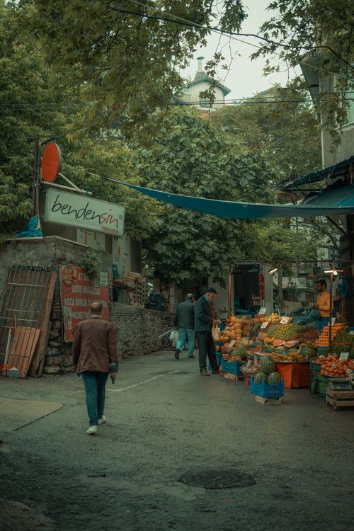 Free A bustling street market scene in Bursa, Turkey, showcasing fresh produce and local life. Stock Photo