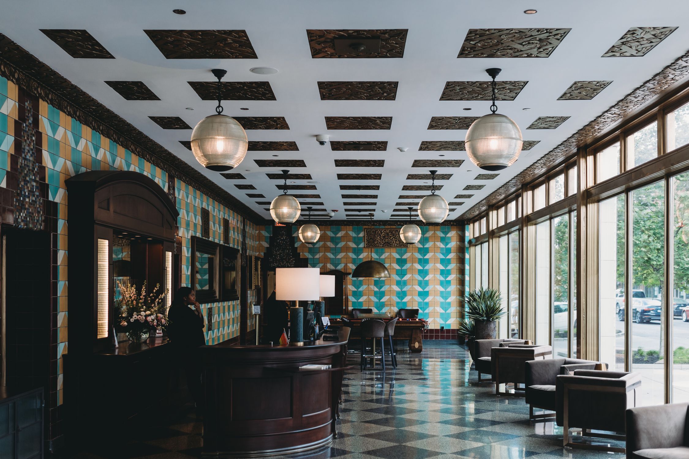 Stylish hotel lobby with modern decor and natural lighting in Indianapolis, Indiana.