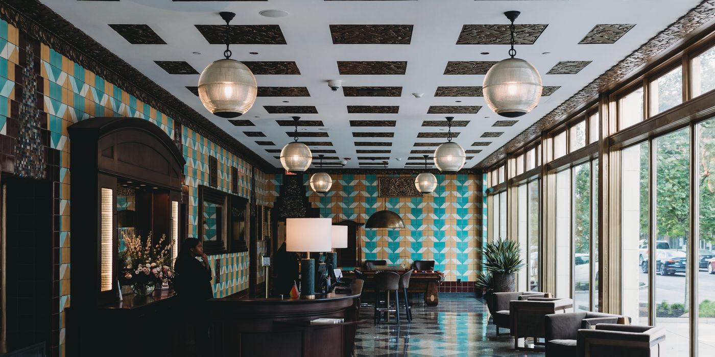Stylish boutique hotel lobby with modern furniture and natural light