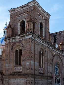 Detailed view of the New Cathedral of Cuenca, showcasing its architecture under a clear sky.