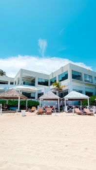 Stunning beach resort with modern architecture in sunny Cancún, Mexico.