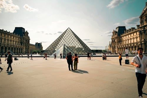 People around Louvre Pyramid 