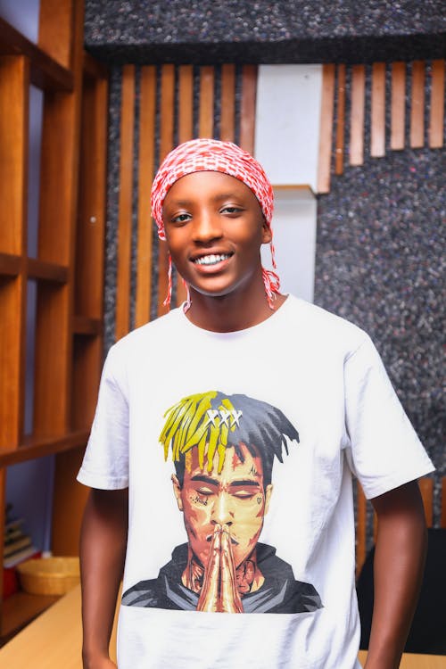 Young Man Posing in T-Shirt and Headscarf