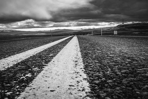 Empty Road and Cloudy Sky