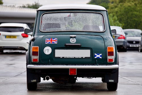 Green Mini Cooper in Rain