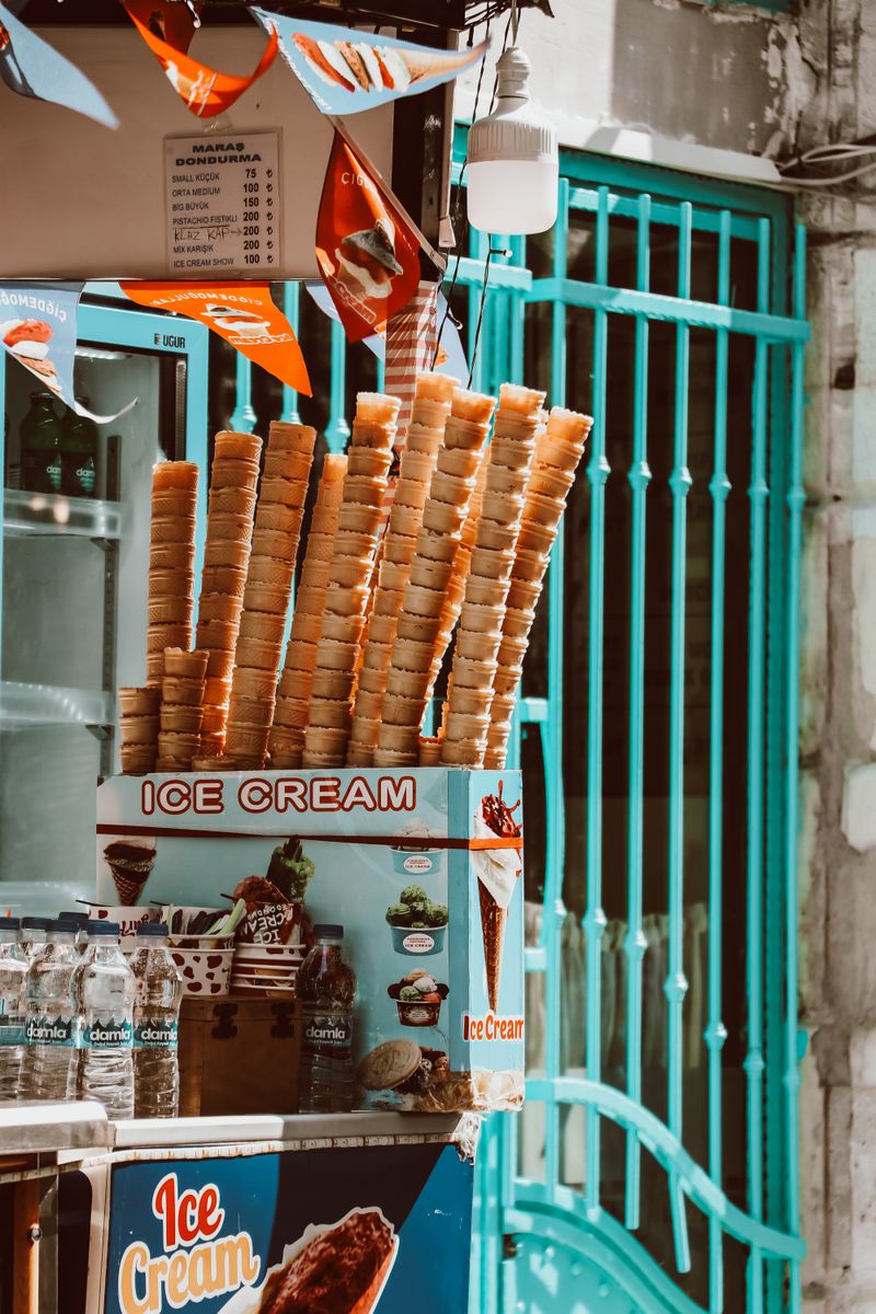 Tall stacks of waffle cones at a stall