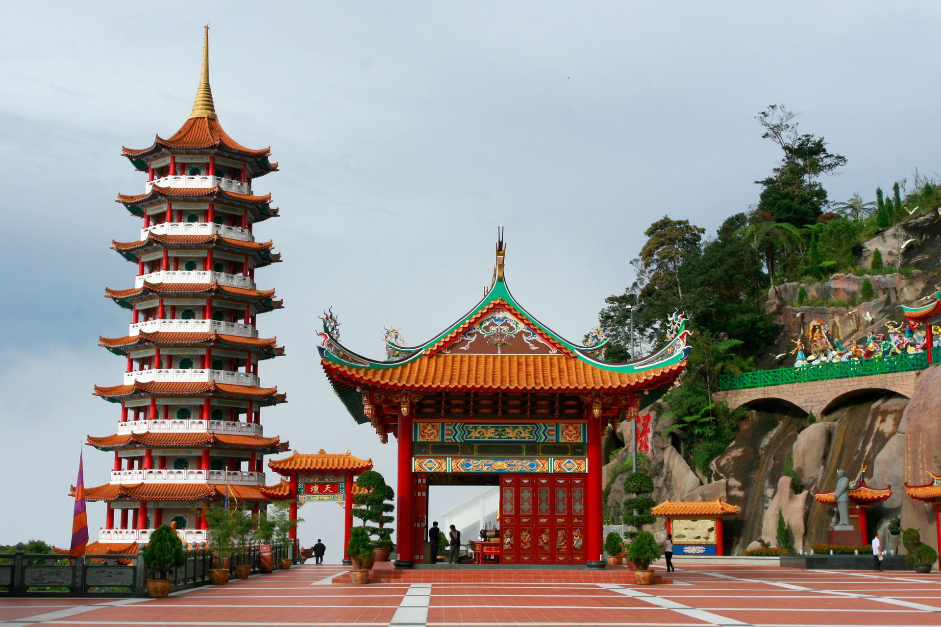 Vibrant Chinese architecture of Chin Swee Caves Temple in Genting Highlands, Malaysia. Iconic pagoda and gate.