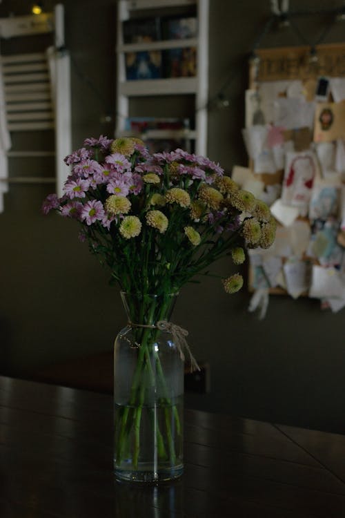 Wildflowers in Glass Vase on Table