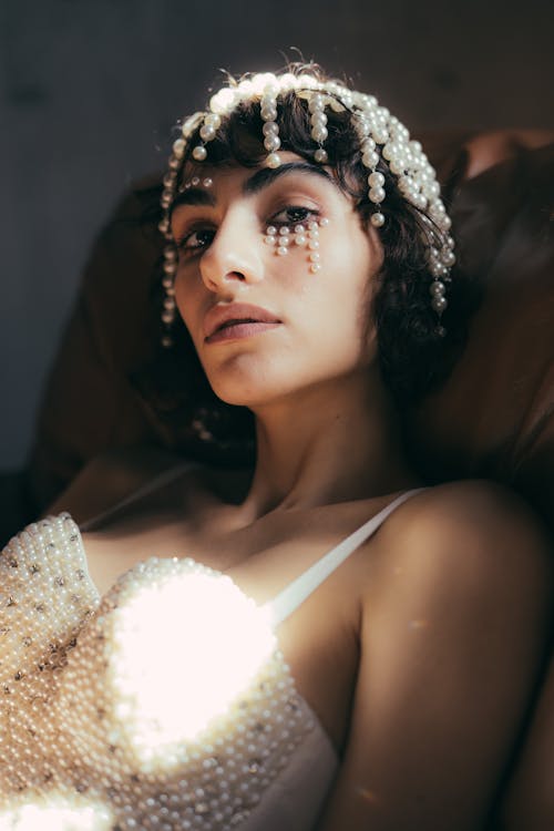 Portrait of Woman with Beads in Hair