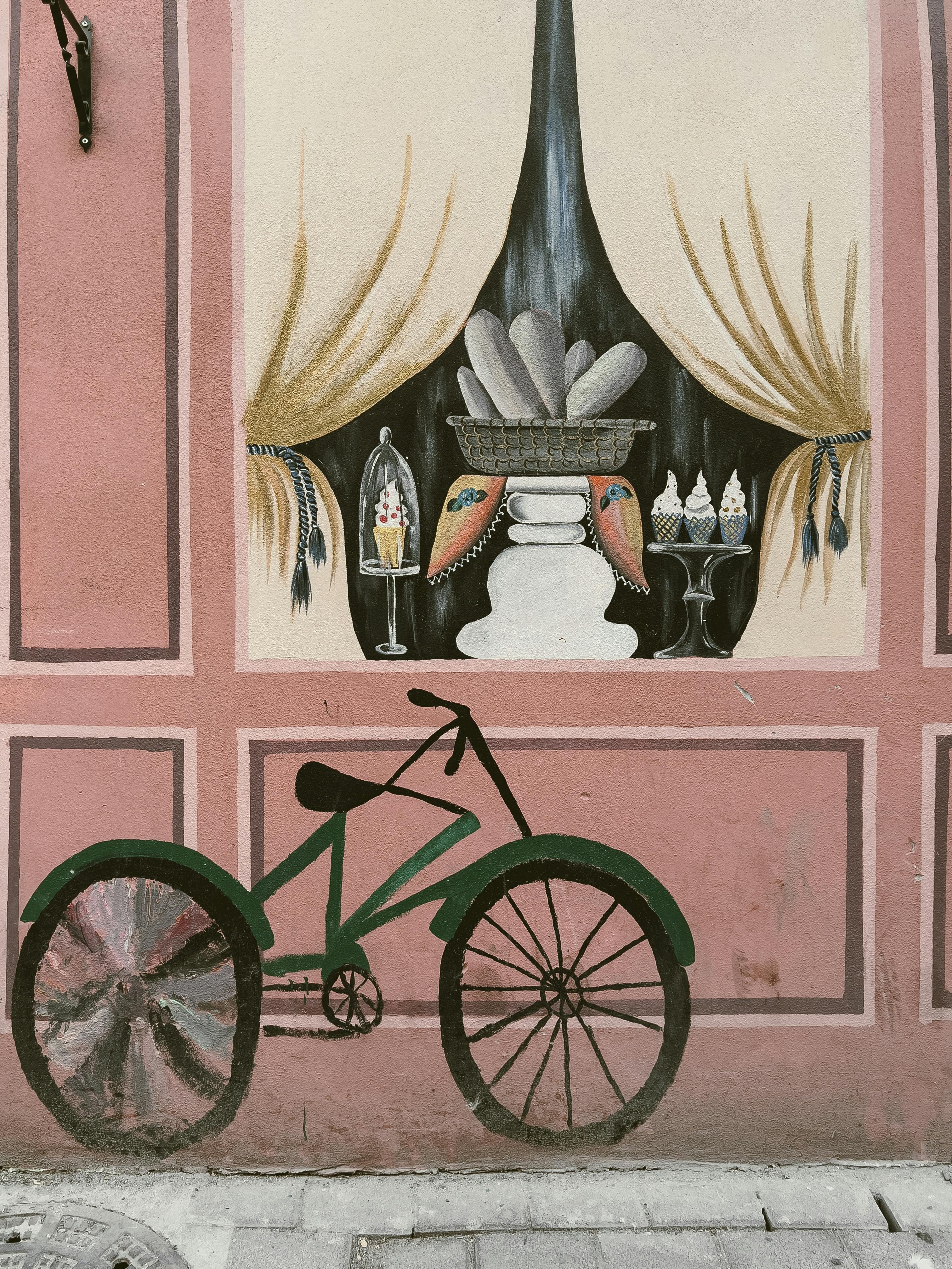 Bike Next to a Pink Wall Free Stock Photo