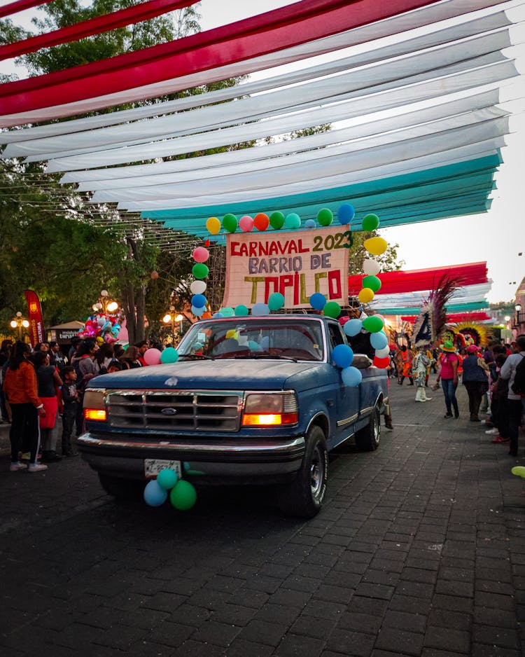 Truck With Balloons On City Carnival