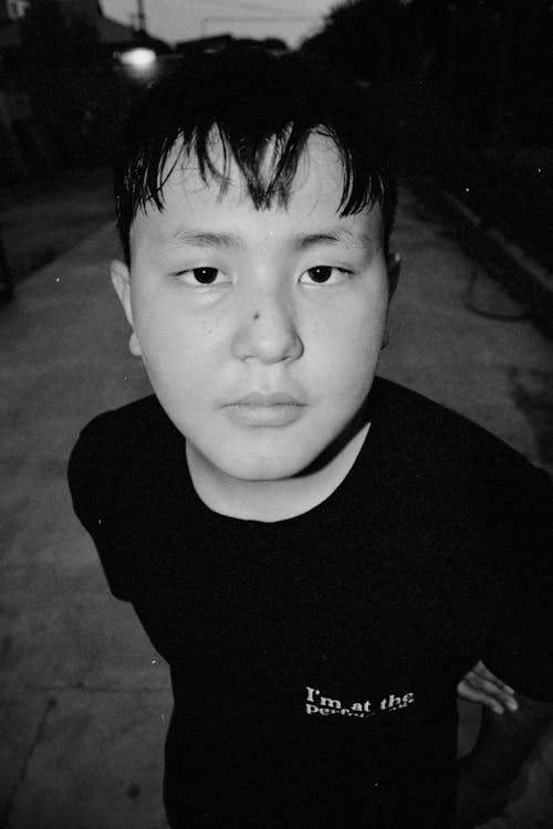 Portrait of Teenage Asian Boy on Street