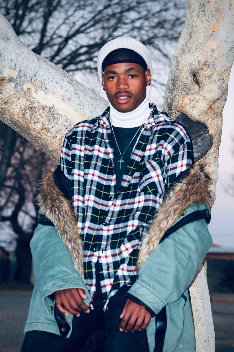 Model Posing In Checked Shirt And Jacket