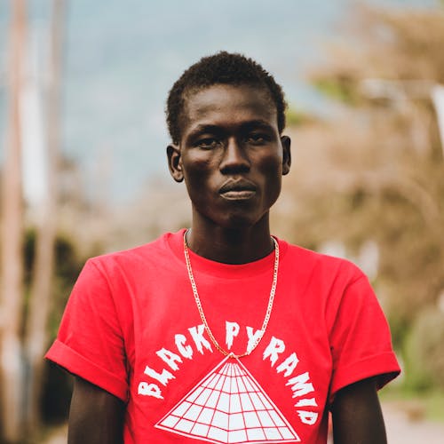 Photo of Man Wearing Red Shirt