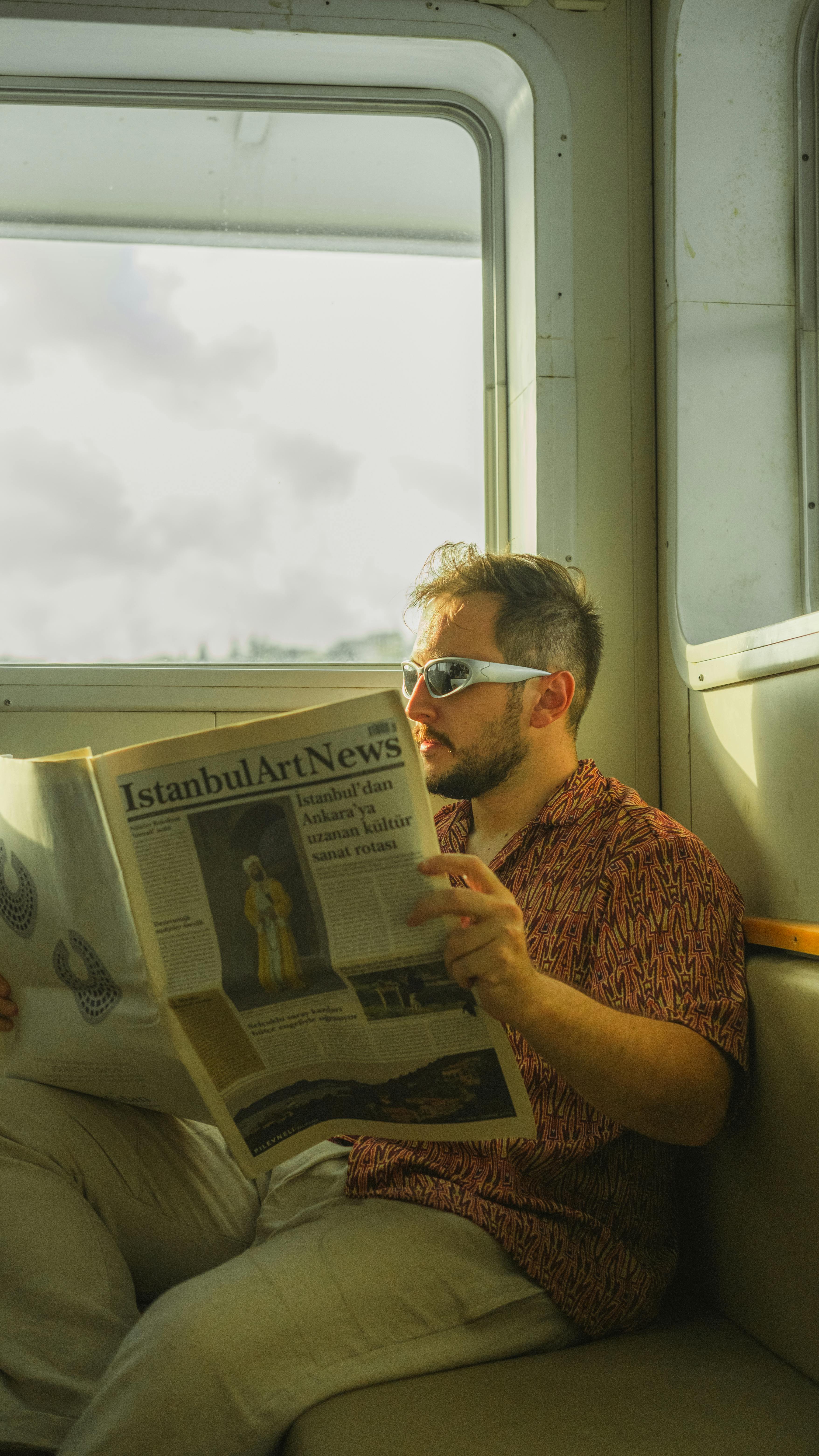 Full length shot of serious man dressed in black coat, wears sunglasses and  medical mask, reads newspaper, poses against brick wall, prevents himself  from coronavirus. Epidemic and quarantine 7906424 Stock Photo at Vecteezy