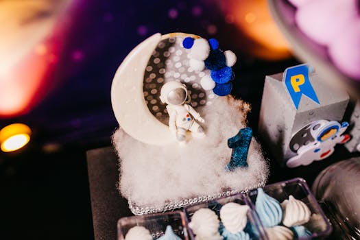A close-up of a space-themed cake decoration with an astronaut figurine and the number one in a cosmic setting.