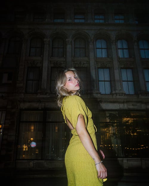Blonde Woman Wearing Yellow Dress at Night 